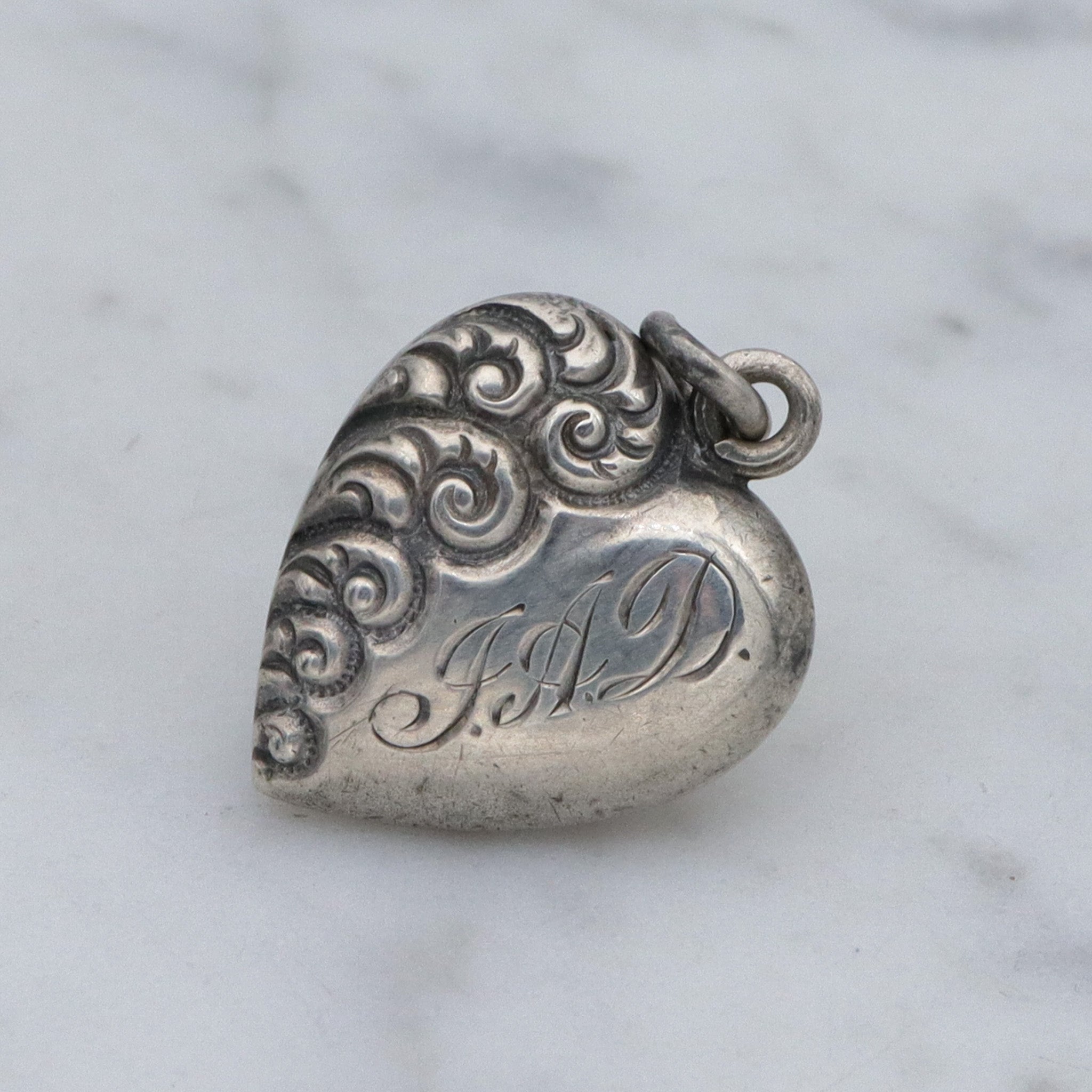 Antique Victorian repousse puffy heart charm pendant with monogram “J.A.D”